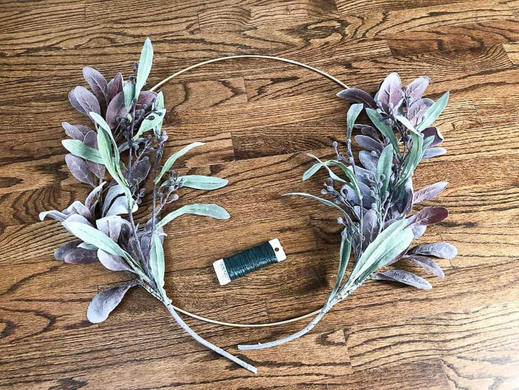 Layer the purple lambs ear with the purple mimosa spray stems. 