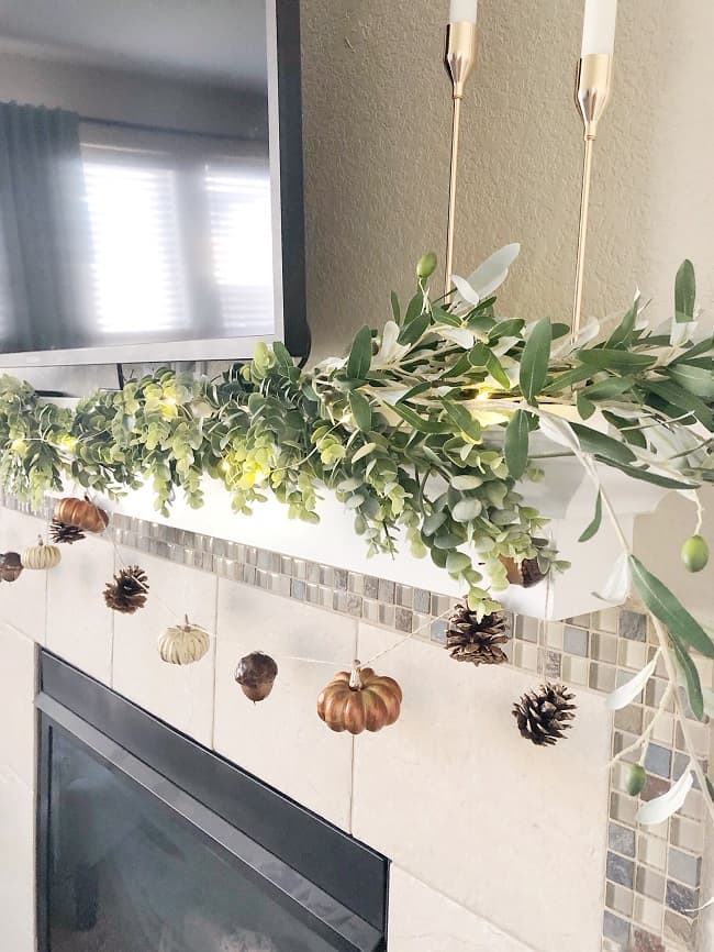 DIY fall garland for your fireplace or home using pumpkins, pinecones and acorns from Hobby Lobby. 
