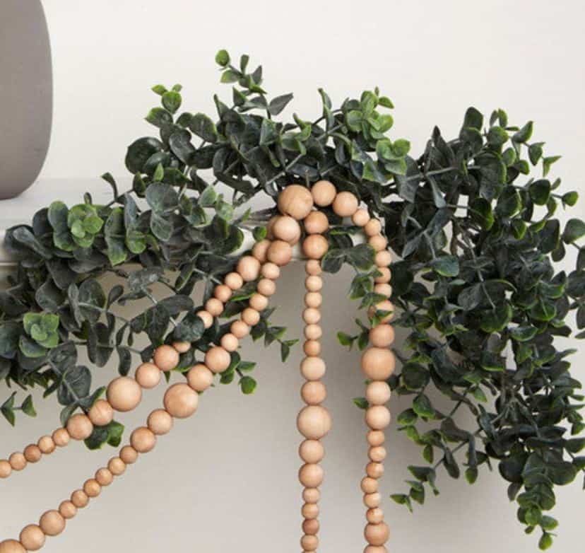Etsy shop Marquisweaves wood bead garland. 