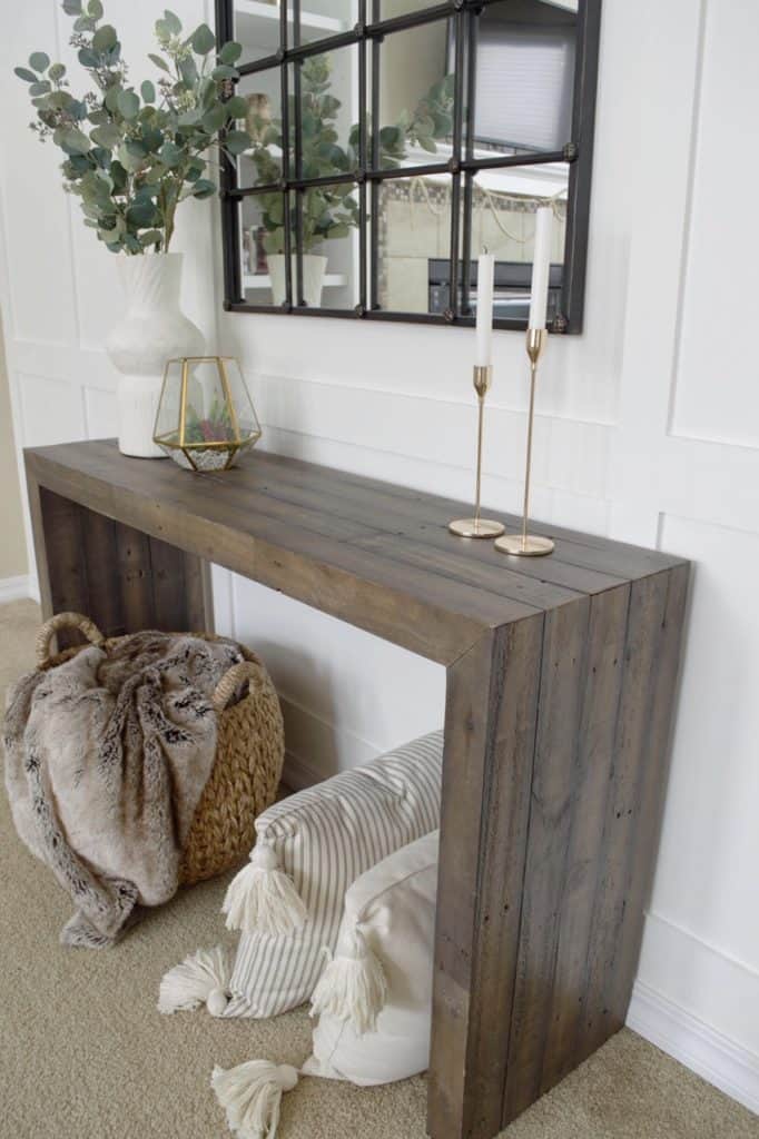 This console table is beautiful and has a neutral wood tone with lots of character. 