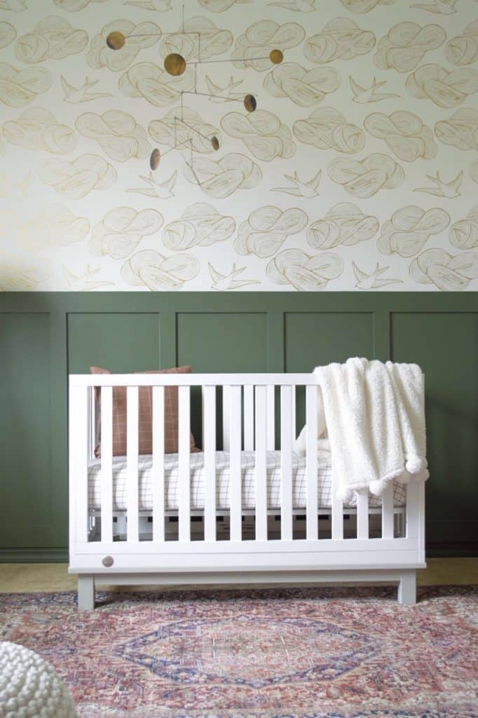 Modern and Vintage Baby Boy Nursery with DIY Board and Batten Wall and wallpaper. 
