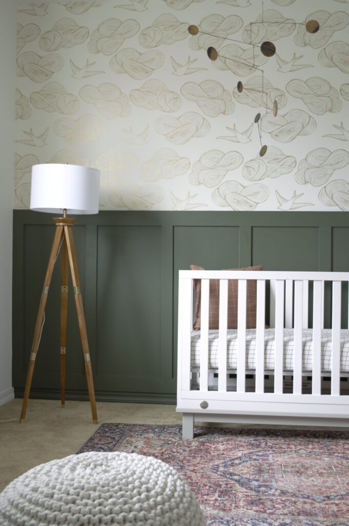 Modern and Vintage baby boy nursery with a board and batten accent wall painted in Benjamin Moore's Backwoods. 