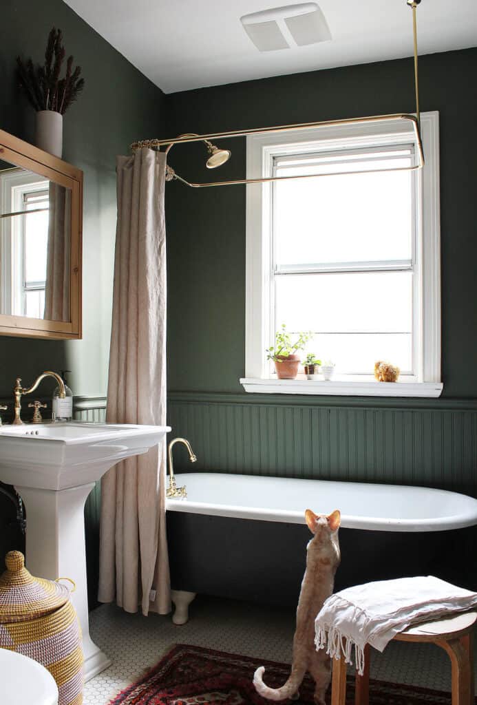 The Marion House Book did a quick bathroom update by painting the walls with Backwoods by Benjamin Moore. 